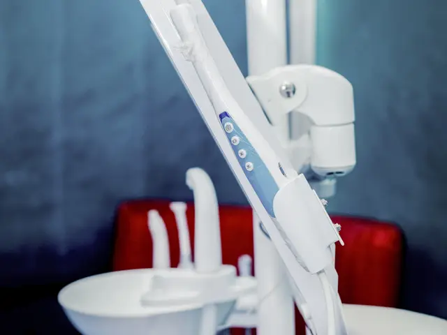 Dental chair and overhead light in an Ota dental clinic